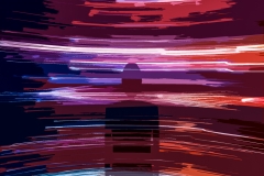 Silhouette of person on traces of light