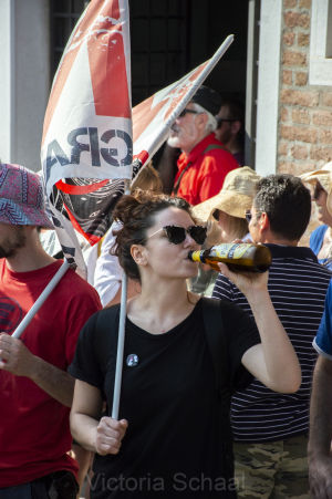 Protester against cruise ships in Venice drinking beer